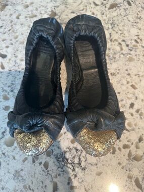Tory Burch Black Leather Ballet Flats with Gold Glitter Toe Cap